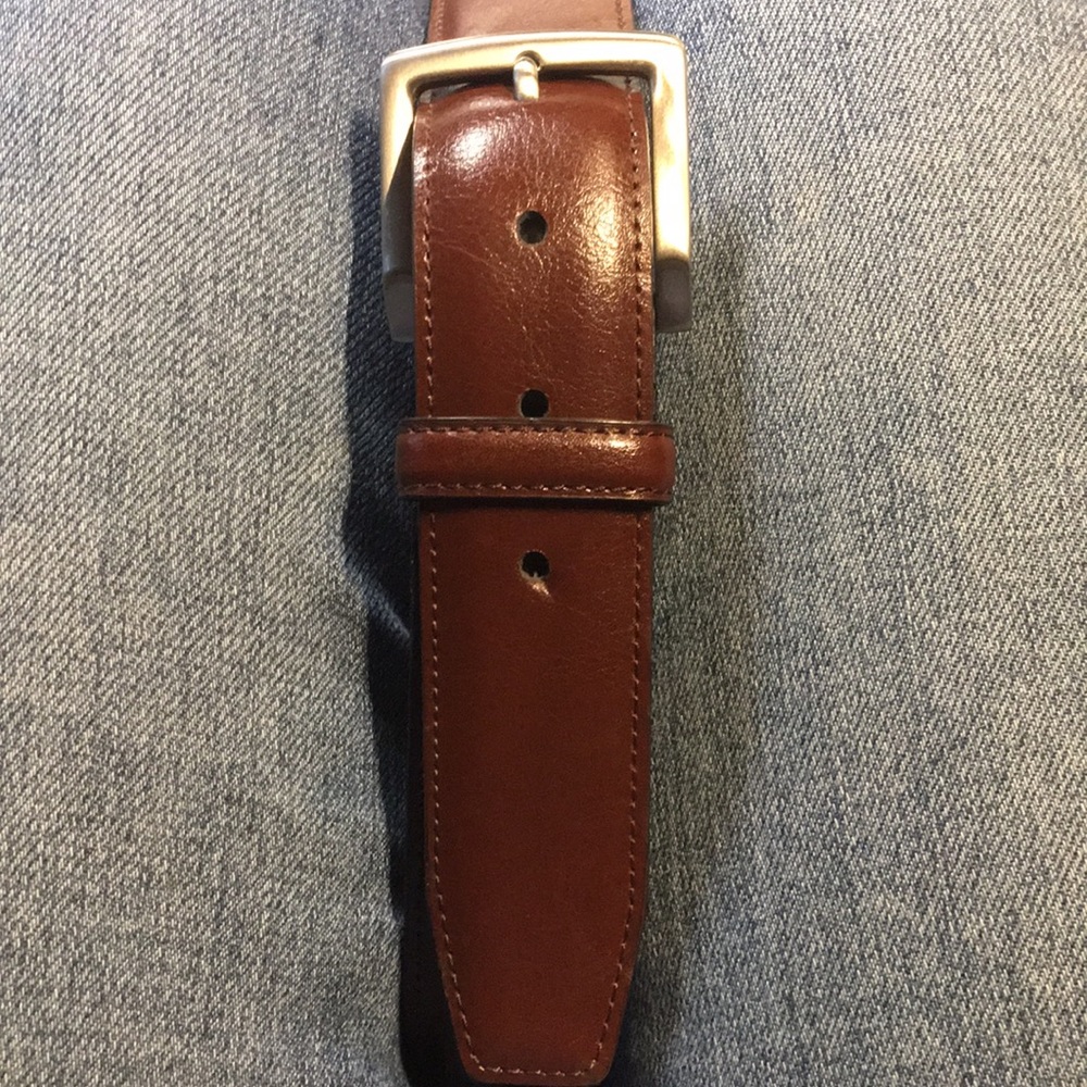 Handsome mahogany brown belt with brushed metal square buckle.